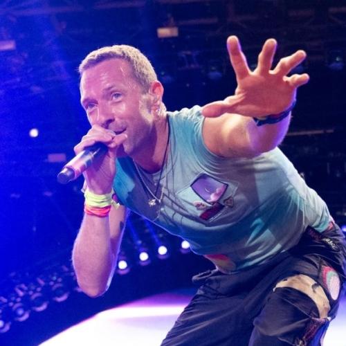 Coldplay & Michael J. Fox Perform Iconic Song At Glastonbury